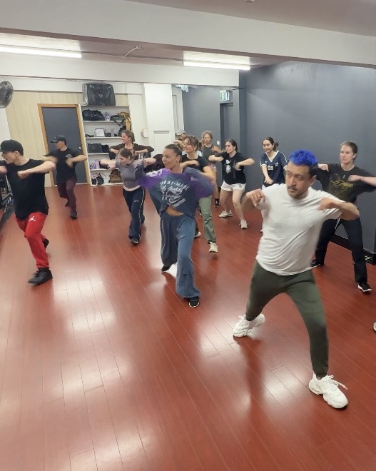 The class running a section together, in unison